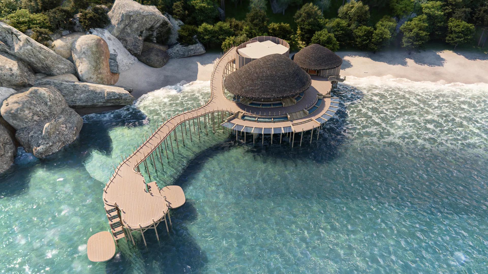 Khu lễ tân mái lá bên biển nhìn từ trên cao — Six Senses, Ninh Van Bay
