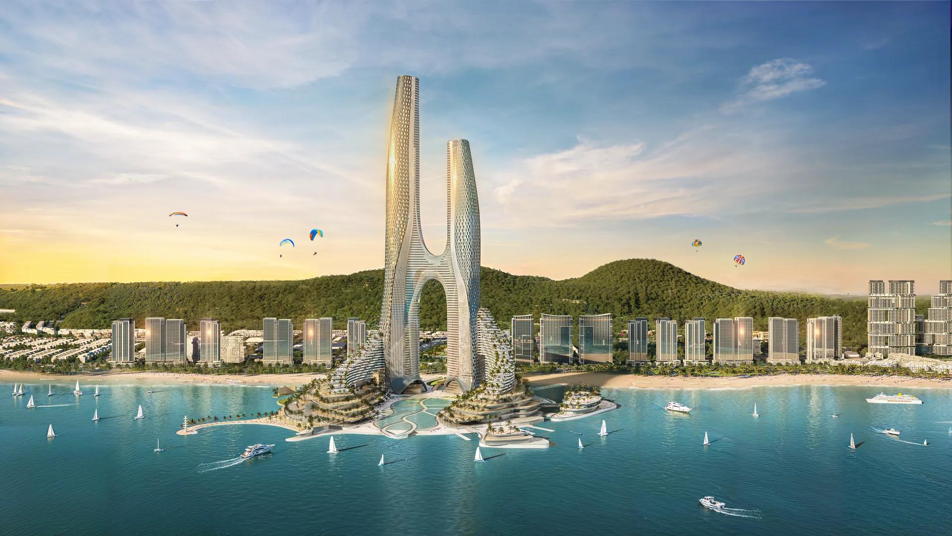 Tháp biểu tượng và khu đô thị ven biển lúc hoàng hôn — Sun Elite City, Quảng Ninh
